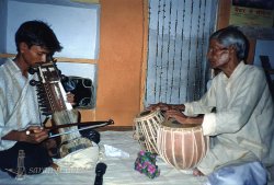 accompanied by his father Dildar Khan on tabla